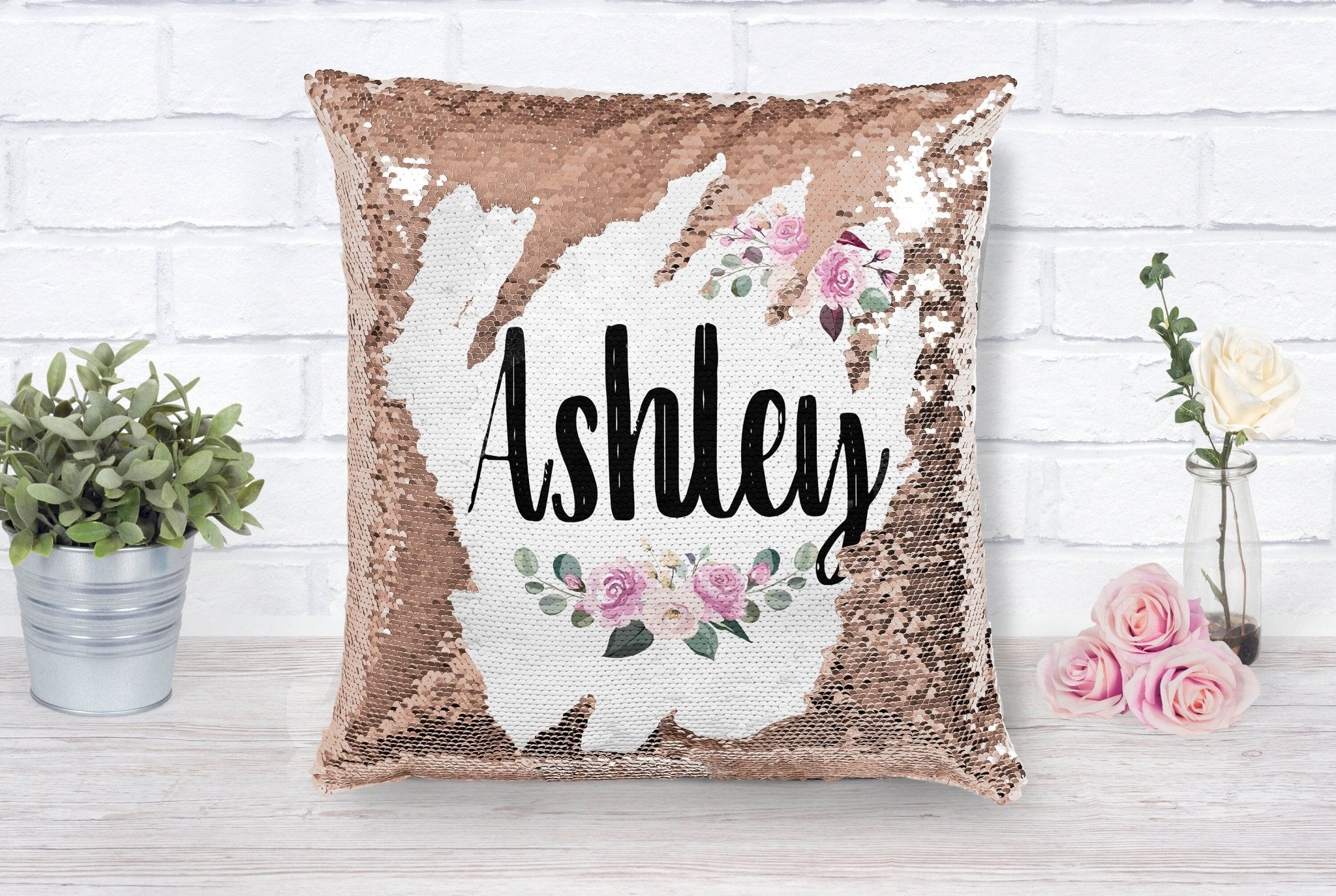 Glitter pillow with outlet name